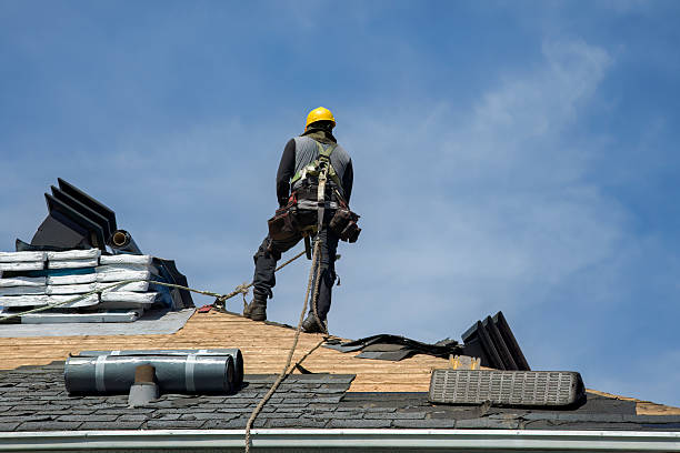 Professional Roof Replacement technician working in Alburtis, PA